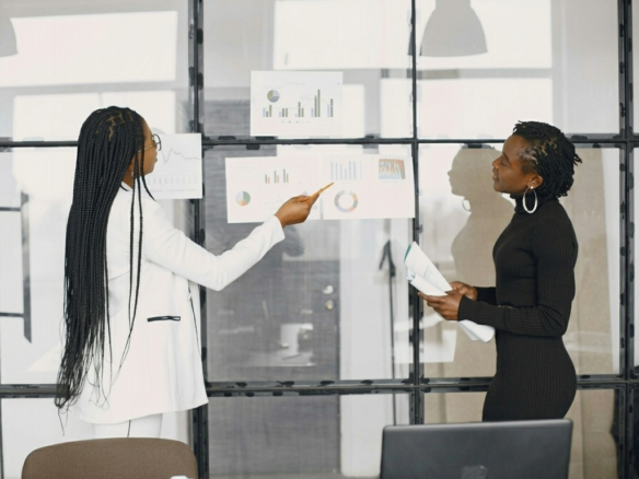 Real estate agent analyzing market trends with a client